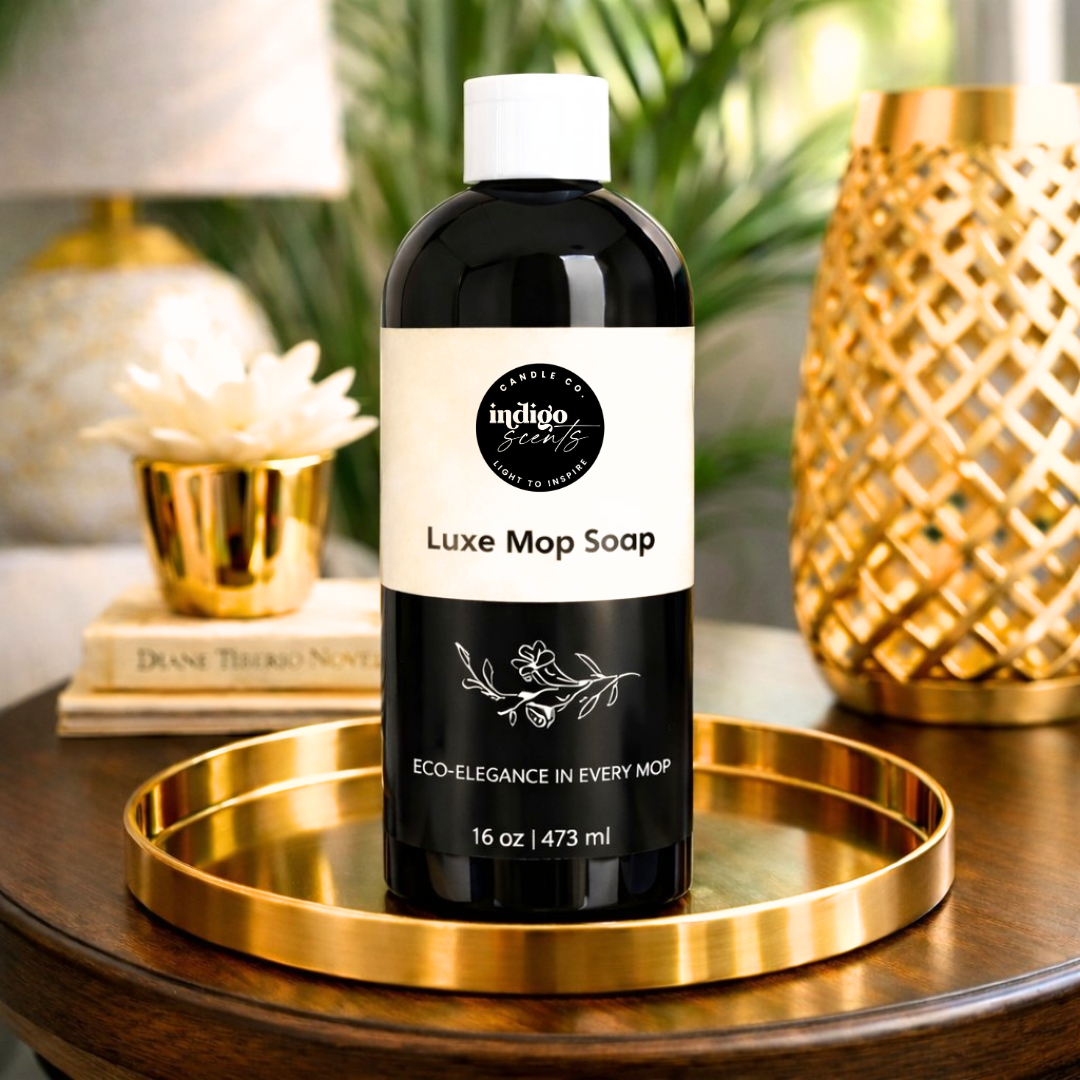 Bottle of Luxe Mop Soap on a gold tray with decorative background