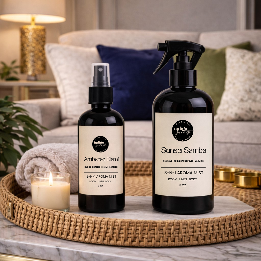 Two black room spray bottles with labels on a tray in a living room setting